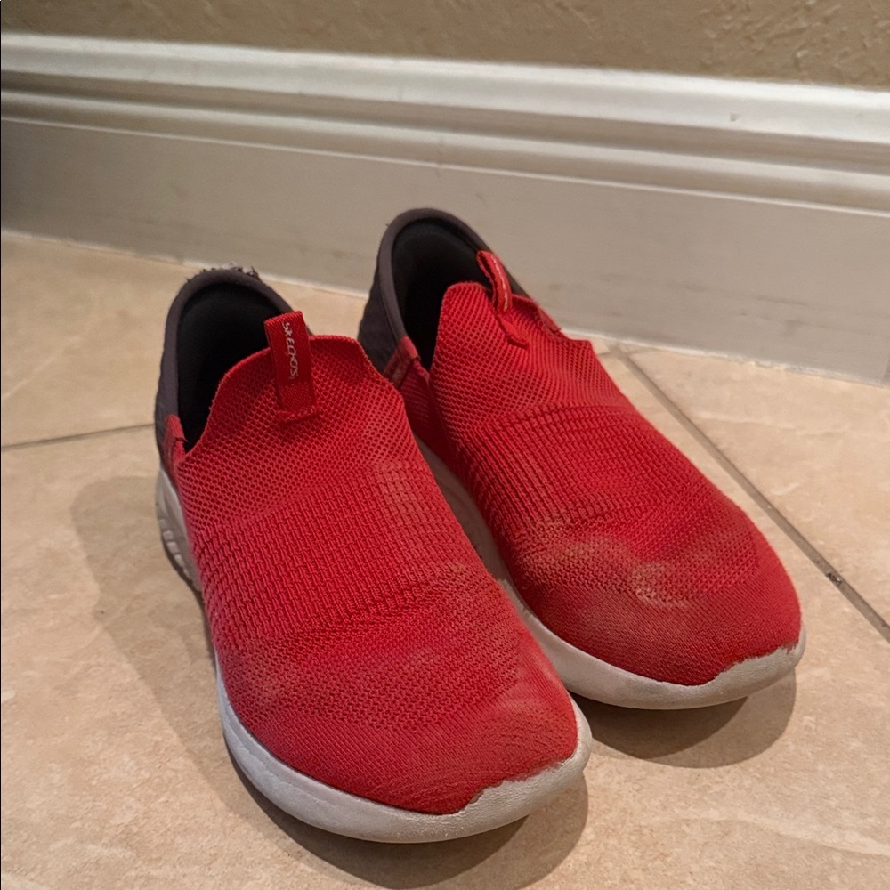Red Slip-On sketchers sneakers used fair condition size 6 see photos
